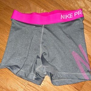 Pink and grey Nike pro shorts